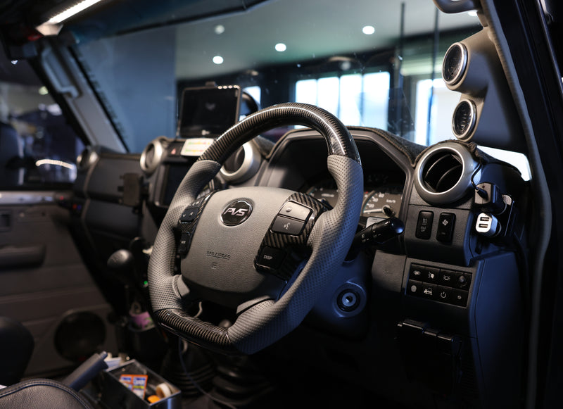 OEM Carbon Grey Leather Steering Wheel with Steering Controls Insert to suit Toyota LandCruiser 70 Series **PRE-ORDER FOR JANUARY**